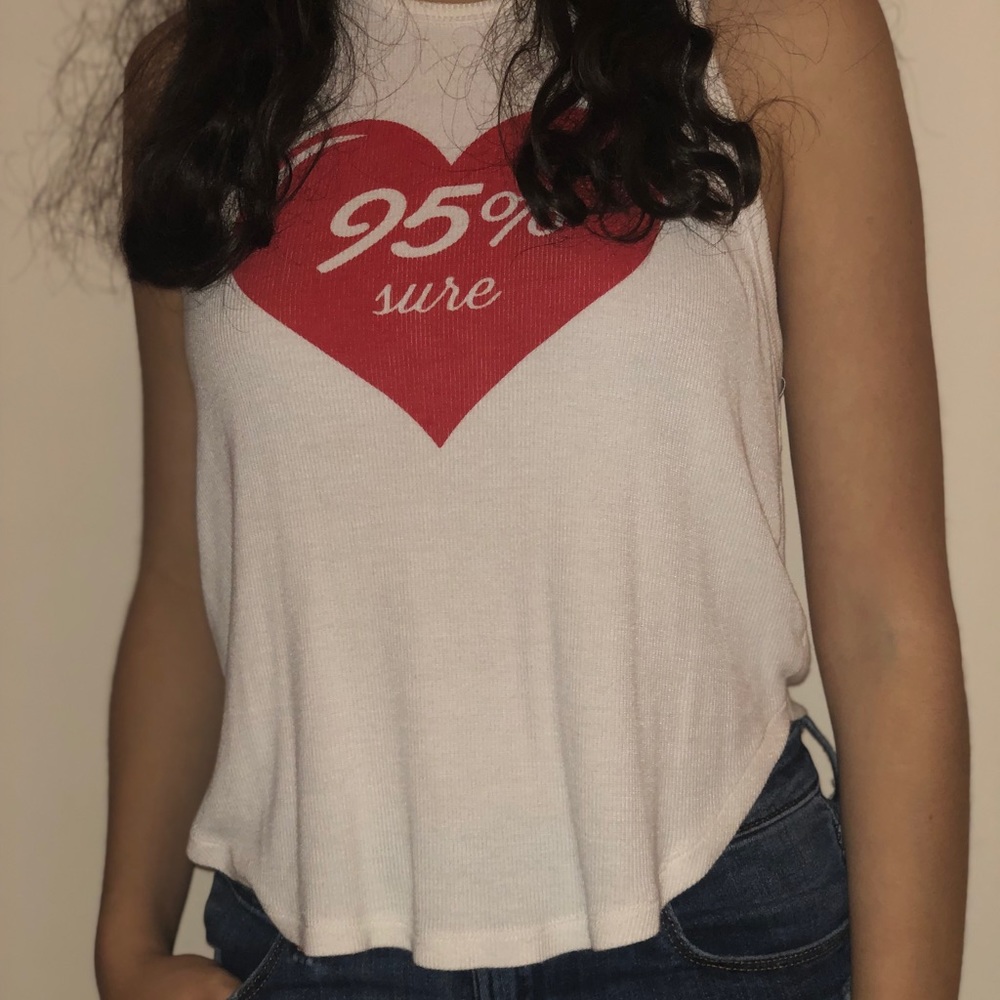 flowy white tank “95% sure”